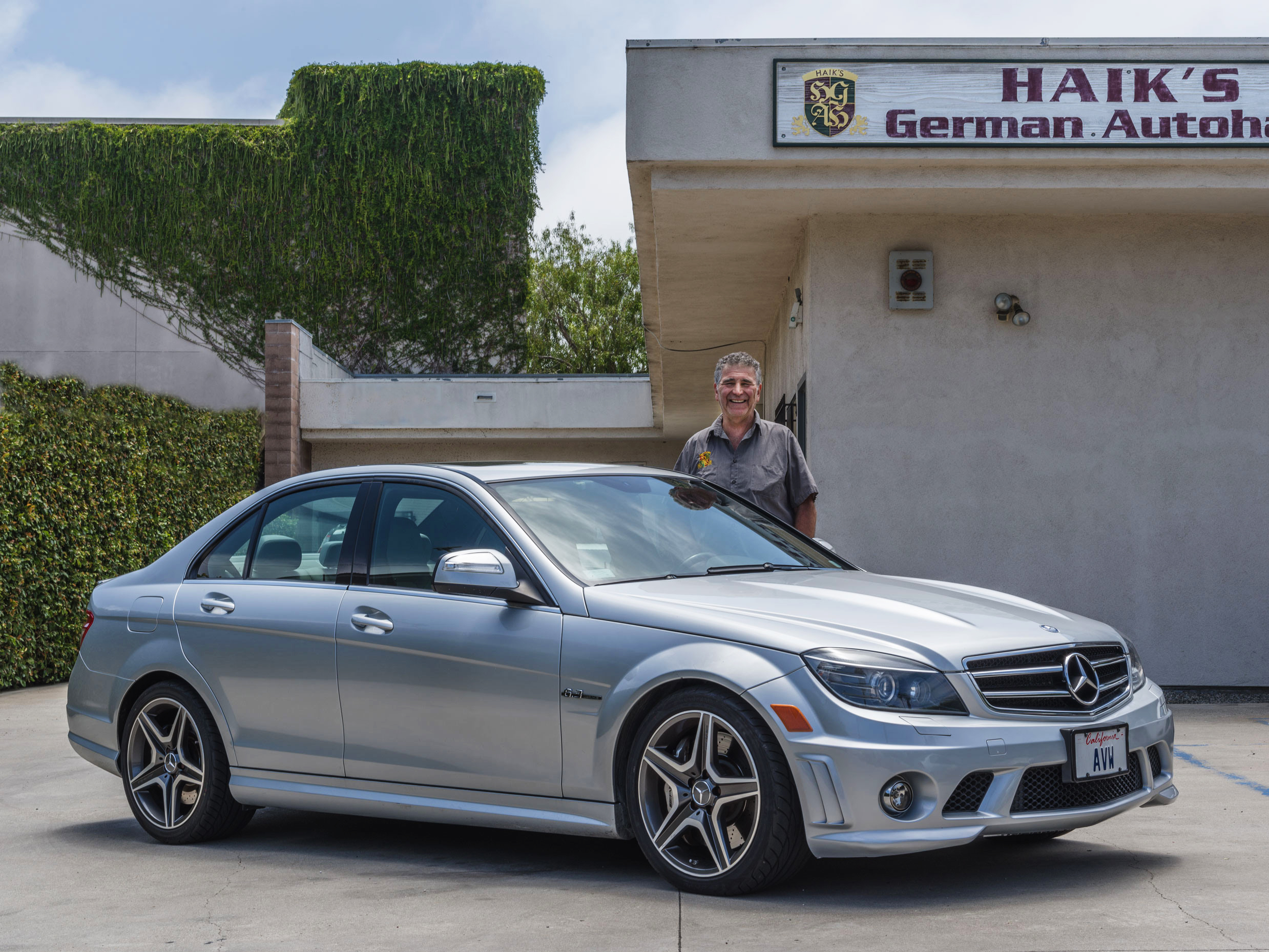 View of Haik and repaired Mercedes sedan at Haik's German Autohaus